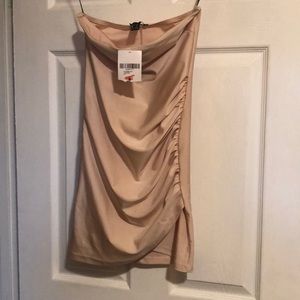 Champagne color dress never worn still has tags
